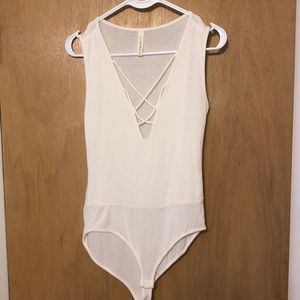 White crisscross body suit
